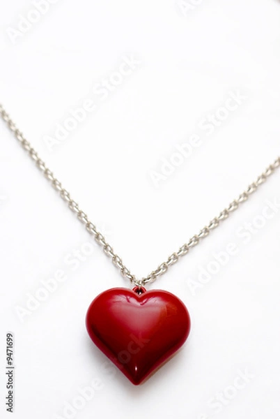 Obraz A silver necklace with a large heart shaped pendant
