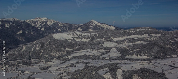 Fototapeta góry w chmurach