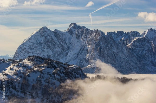 Fototapeta góry w chmurach
