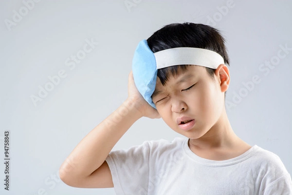 Fototapeta Boy headache and ice gel pack