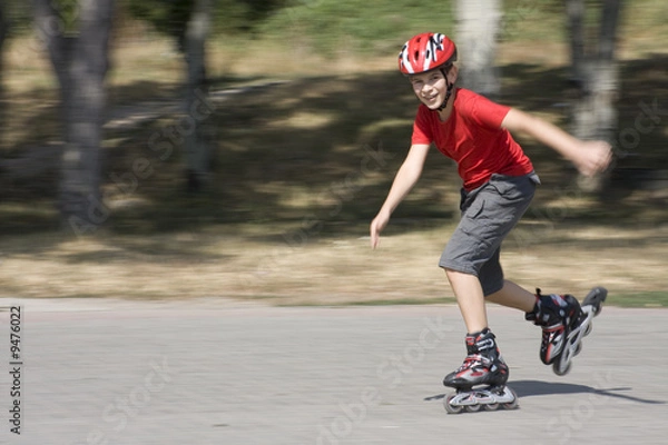 Obraz boy skating on the rollerblades