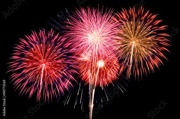 Fototapeta Fireworks light up the sky with dazzling display