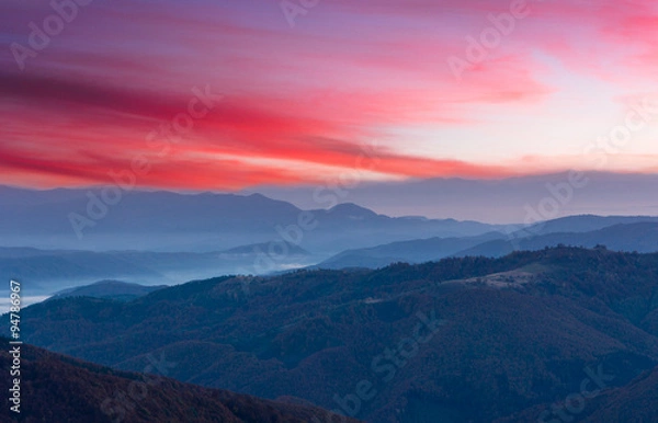 Fototapeta Colorful sunset  in the autumn mountains.