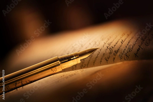 Obraz penna stilografica con libro antico