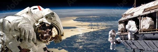 Fototapeta Zespół astronautów wykonujących prace na stacji kosmicznej. - Elementy tego zdjęcia dostarczone przez NASA.