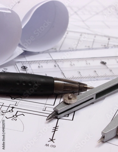 Obraz Rolls of electrical diagrams and accessories for drawing