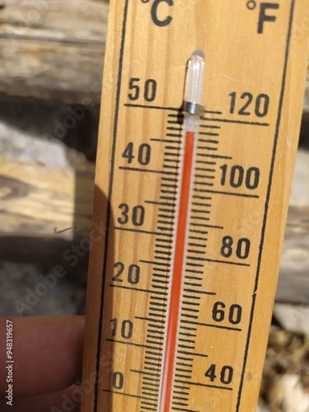 Fototapeta Thermometer Indicating High Temperature of 46 Degrees Celsius - Significant Summer Heat, Analog Thermometer Indicating Temperature of Around 115 Degrees Fahrenheit - Intense Hot Conditions, High Ambie