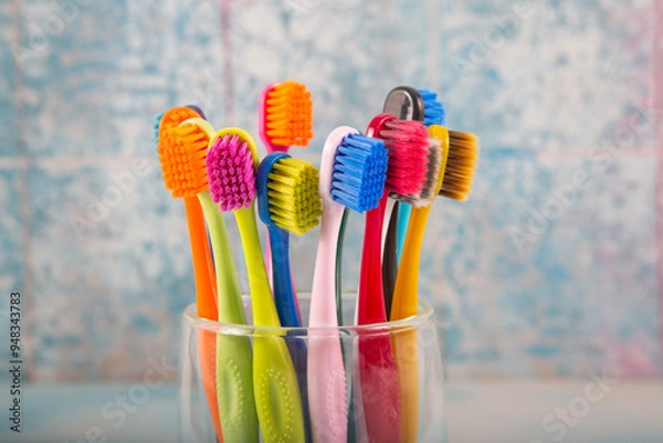 Fototapeta Toothbrush and toothpaste, squeezing toothpaste from tube onto toothbrush close-up. Daily oral care after meals concept.