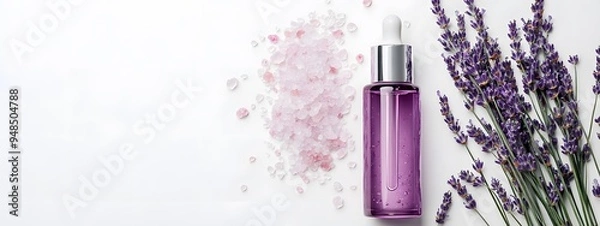 Obraz A bottle of purple serum with lavender flowers and pink sea salt on a white background, flat lay, top view, stock photo, aesthetic beauty concept, flat-lay photography,