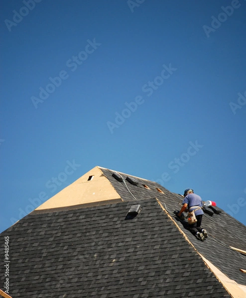 Obraz Roofer installing new shingles