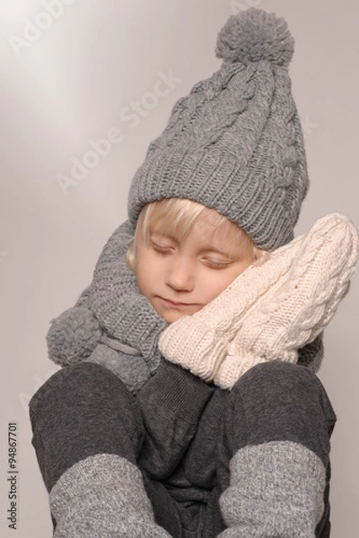 Fototapeta boy dressed in warm clothes