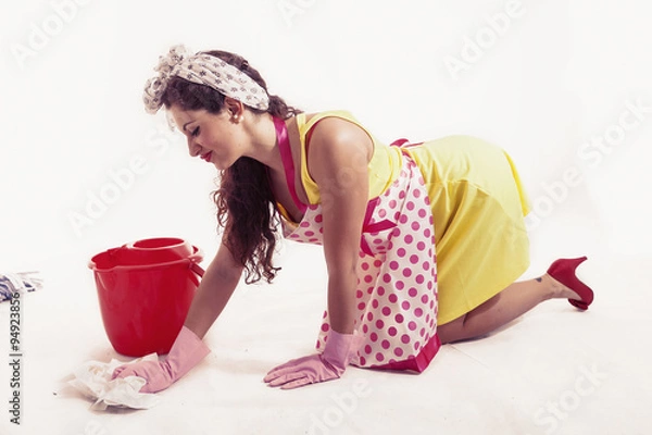 Fototapeta pretty housemaid with cloth and bucket cleaning the floor