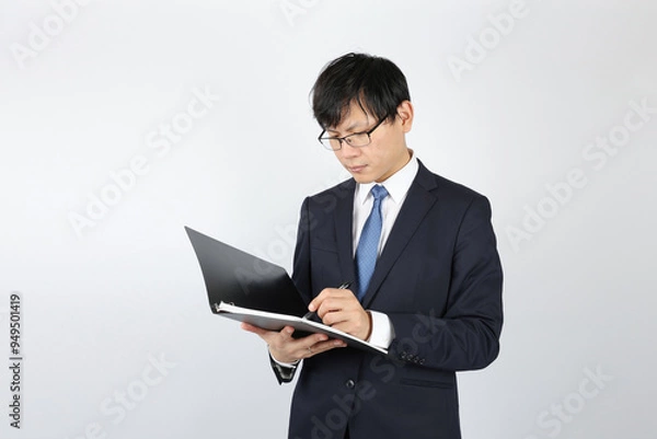 Fototapeta 記入・メモを取る男性ビジネスマン