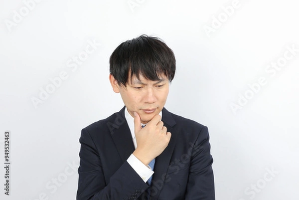 Fototapeta 解決方法を考えるビジネスマン