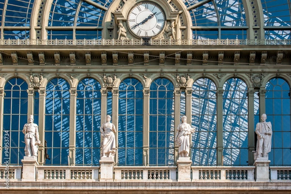 Fototapeta Sight by day of the clock that is on the outside of the train station terminal Budapest - Keleti, Hungary