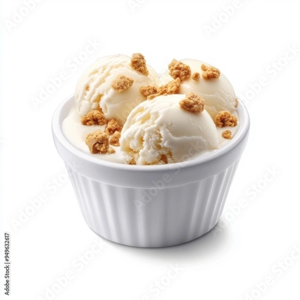 Fototapeta vanilla ice cream with crushed cookies, served in a white porcelain dish.
