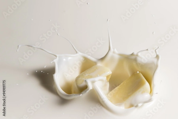 Obraz white chocolate falls in milk