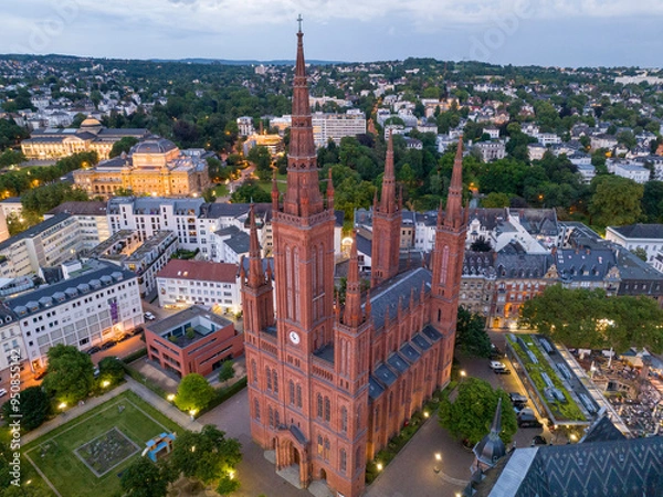 Fototapeta Aerial Drone Shot of Cathedral at Marktkirche in Wiesbaden, Germany. Old town and the city center at Evening Twilight.