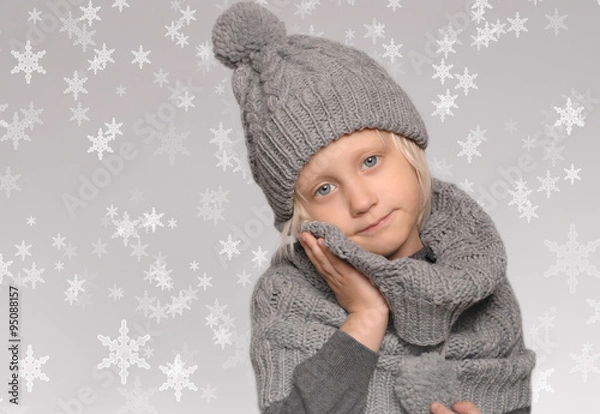 Fototapeta cute little boy, warmed his cheek a soft and warm shawl