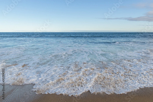 Fototapeta Beach and coming waves