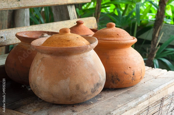 Obraz Clay pots or porttery on a shelf  outside kitchen room