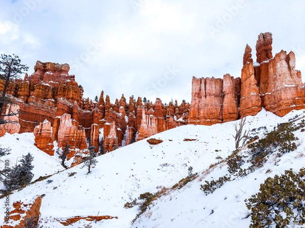 Obraz Snow scene colorful cliffs with red rock and stone in Bryce Canyon National Park