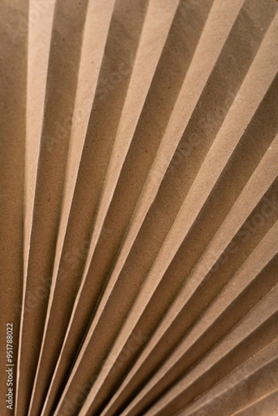 Obraz Vertical background of corrugated brown paper. Folded paper from fallen leaves