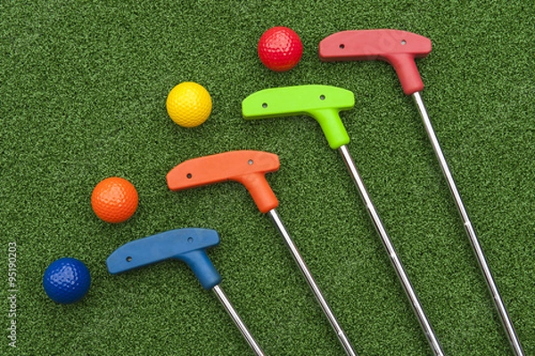 Obraz Four Mini Golf Putters and Balls