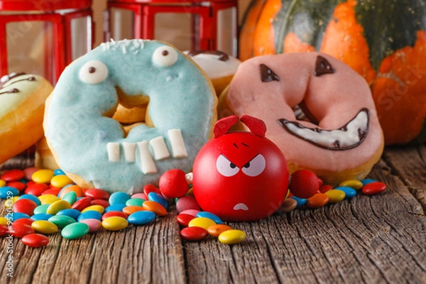 Obraz Halloween donuts on wooden table