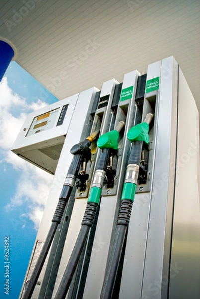 Obraz fuel pumps in a gas station, low angle view