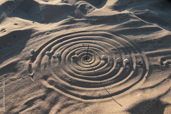 Obraz Conceptual sundial on the beach sand