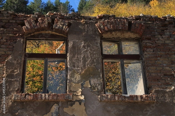 Fototapeta Two destroyed windows in small town near Sarajevo