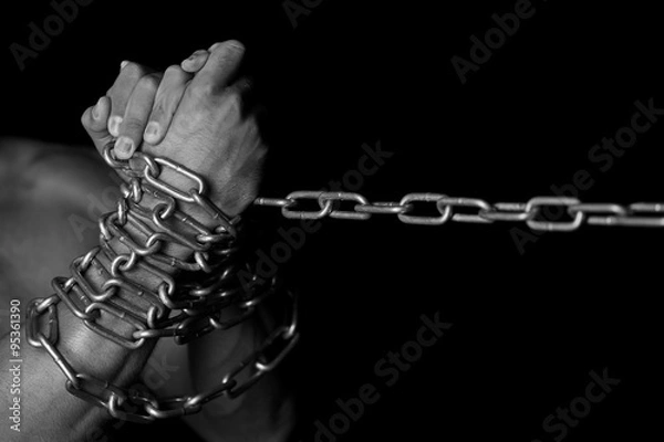Obraz man's hands in chains