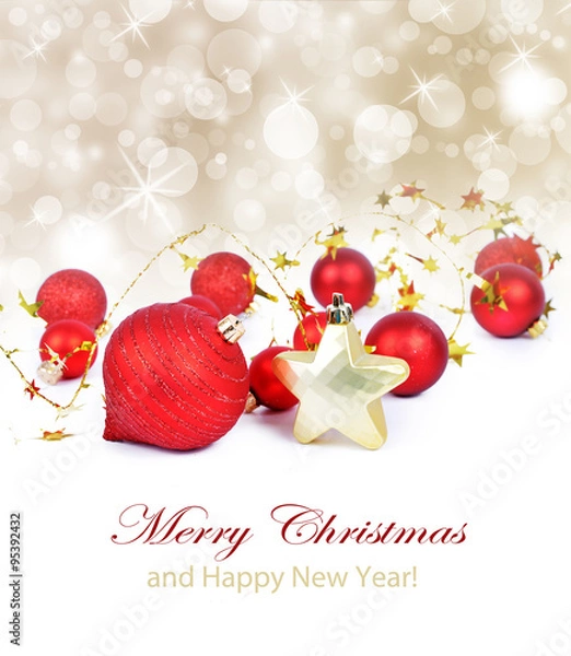 Fototapeta Colorful christmas decoration baubles on white with space for text