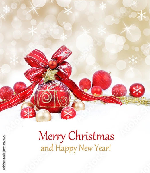 Fototapeta Colorful christmas decoration baubles on white with space for text