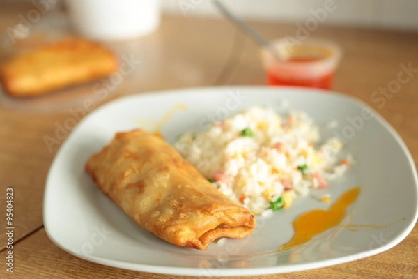 Fototapeta fried rice and spring roll with sweet and sour sauce