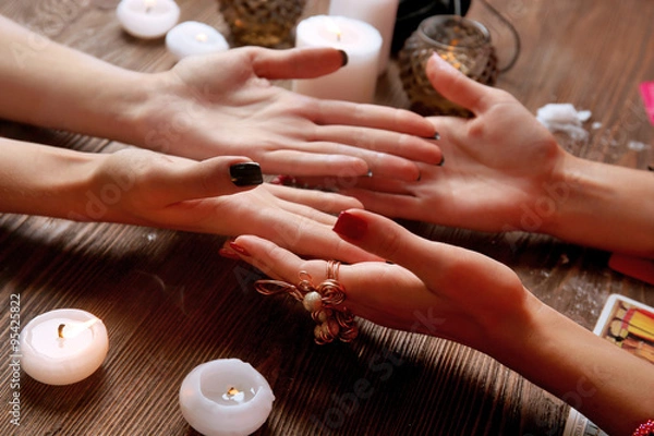 Fototapeta Witch - fortune teller reading fortune close up