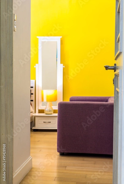 Fototapeta Interior Design: Relaxing colorful living space in bedroom./ Interior Design, Beauty Living space: Sofa bed, White Wooden bedside table and reading lamp, Living space in Bedroom.