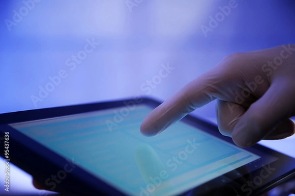 Fototapeta Doctor working with tablet-pc, close up