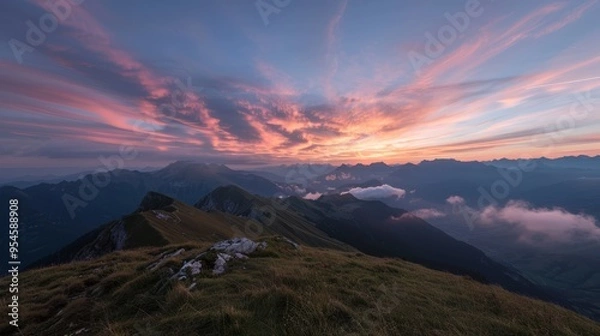 Obraz Sunset in the Alps mountains, with a vibrant cloud layer beneath and a sky full of breathtaking colors