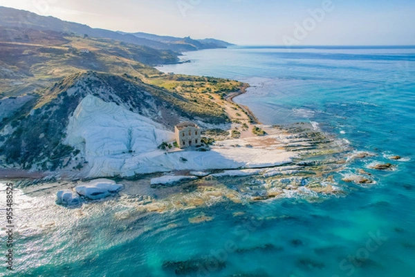 Fototapeta Punta Bianca, near Agrigento in Sicily Italy. Beach with ruins of an stone house on white cliffs.