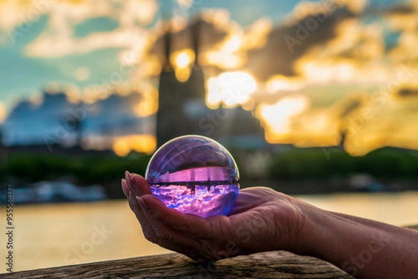 Fototapeta Close up of lensball at sunset in Cologne with Cologne Cathedral in background, Germany.
