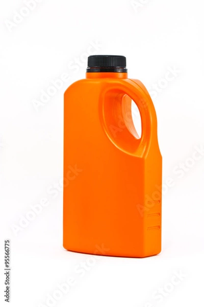 Obraz Orange color plastic bottle on white background