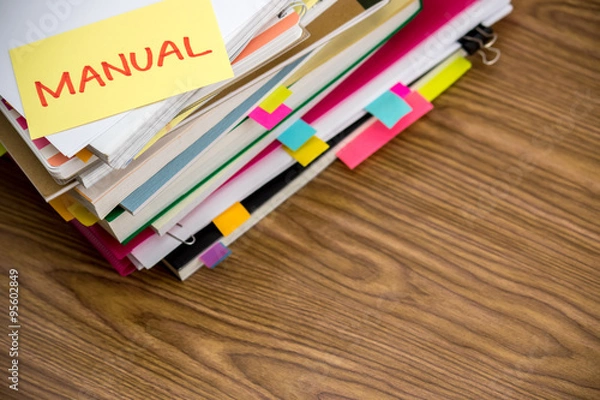Fototapeta Manual; The Pile of Business Documents on the Desk