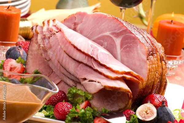Obraz Holiday table setting with delicious whole baked sliced ham