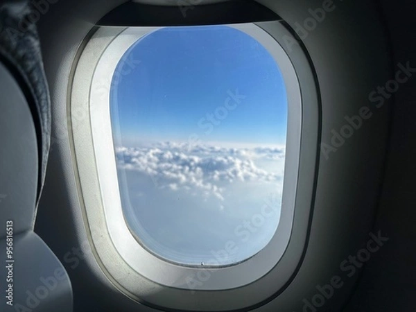 Fototapeta Beautiful view through plane window during flight