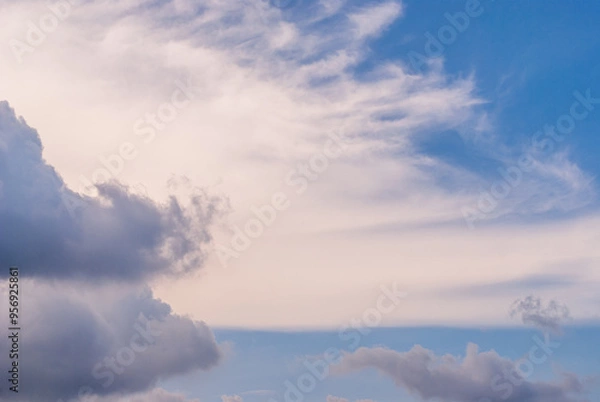 Fototapeta The sky is blue with a few clouds scattered throughout