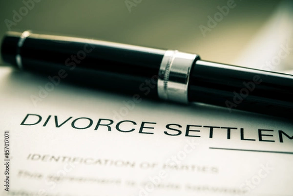 Fototapeta Formal Divorce Settlement Agreement Document with Pen for Legal Representation and Client Review of Terms