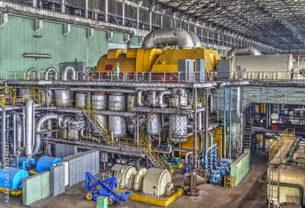 Obraz Machine room in thermal power plant with electric generators and turbines