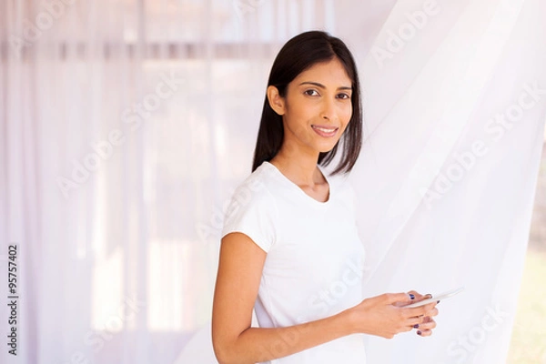 Obraz indian woman holding smart phone